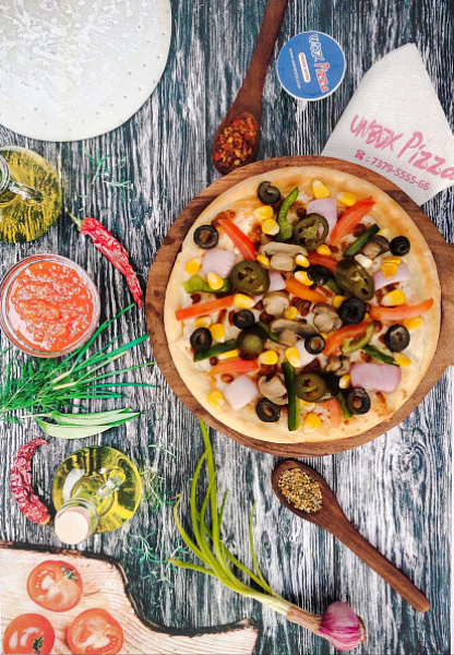 Unbox Pizza Special 7 Inch